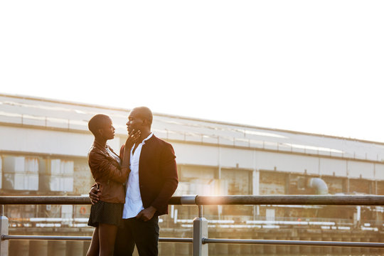 Couple embracing outdoors 