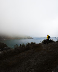 Yellow Jacket Man Fog Mountain Wallpaper