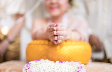 Obraz na płótnie Canvas Traditional Thai wedding ceremony in local luxury vintage costume and wedding equipment.