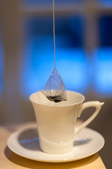 Warm green tea and a finder's cup.