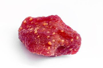 a sweet soft red fruit with a seed-studded surface