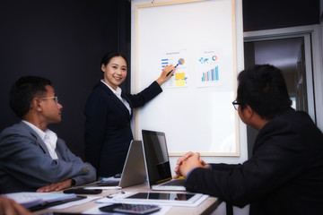 Group of business people meeting about economists working analyzing investment charts. Teamwork successful Meeting Workplace strategy Concept.