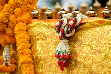 Thai garland on pagoda barricade