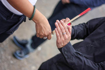 incense fire hand to hand.