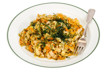VegetVegetarian menu. Braised cabbage with carrots on white platearian menu. Braised cabbage with carrots on white plate. Studio Photo