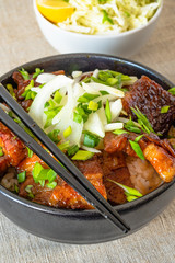 Rice bowl and fried pork belly and  chinese cabbage salad i - traditional Korean dish