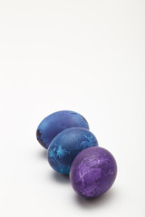 blue Easter eggs on white background