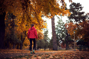 Woman walking in park  