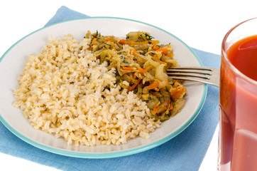 Vegetarian healthy food. Braised cabbage with carrots, brown rice.