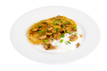 Plate with potato pancakes, fried mushrooms, isolated on white background.