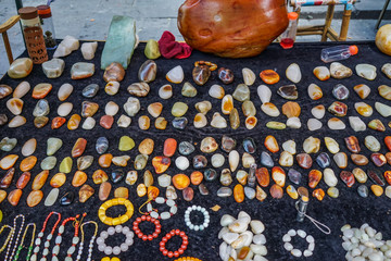 Selling precious stones at street market