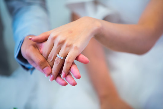 Closeup  photo of get marry with a Beautiful Wedding Ring