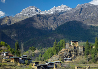 Fototapeta na wymiar Drukgyel Dzong and the Himalayas - Kingdom of Bhutan