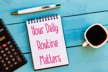 Handwriting text writing Your Daily Routine Matters on notebook