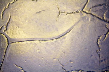 decorative plaster imitating cracks on the surface