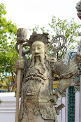 Sculpture chinese stone doll at Wat Phra Chettuphon Wimon Mangkhalaram, Ratchaworamahawihan or Wat Pho
