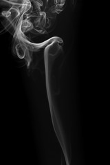 Movement of white smoke on black background