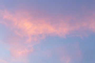 Background of sky with clouds at the golden hour.