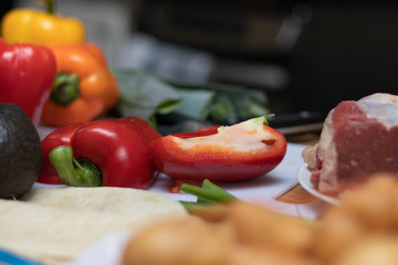 Piece of bell pepper and beef on white plate