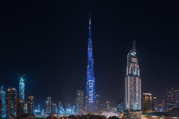 Fototapeta na wymiar The Address Downtown Dubai and Burj Khalifa at night, Dubai, UAE