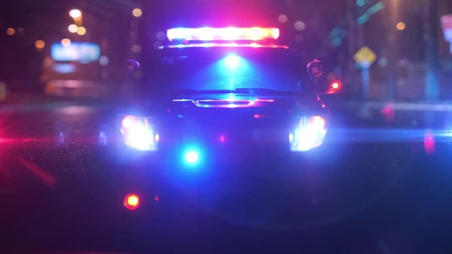 Police Patrol Car at Scene of Emergency (Optical Lens Defocus)
