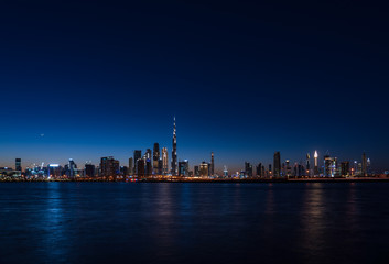 Fototapeta na wymiar Panoramic view of Dubai cityscape at night