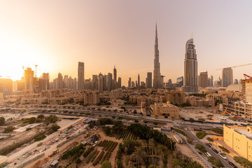 Naklejka na ściany i meble Dubai cityscape with Burj Khalifa at sunset time