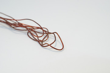 Obraz na płótnie Canvas piece of old rusty twisted wire