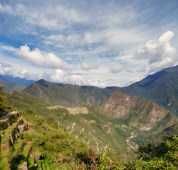 Fototapeta na wymiar Machu Picchu and Huayna Picchu mountain in Peru, seen from the door of the sun
