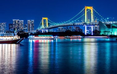 city skyline night view of tokyo bay, rainbow bridge
