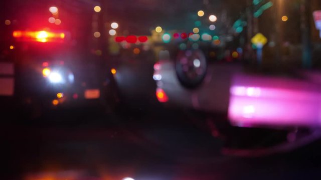Police Patrol Car at Scene of Emergency (Optical Lens Defocus)