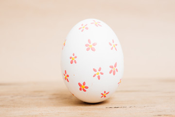 Beautiful Easter White egg on wooden