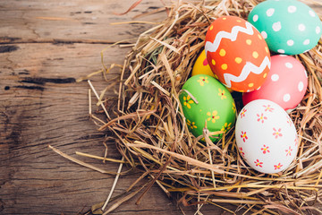 Beautiful Easter multi color egg in straw