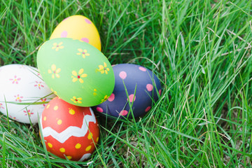 Beautiful Easter Multi color egg on garden
