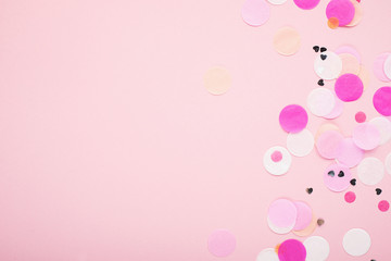 Pink festive universal background with silver confetti. Bright blank for the holiday project. Horizontal,
