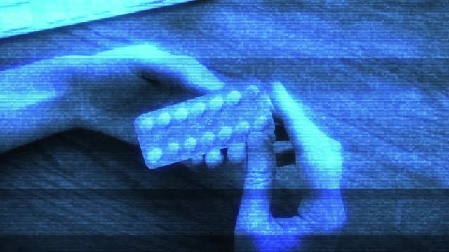 Slow motion point of view personal perspective of woman hands holding pills blister with pills holomatrix bad signal glitch