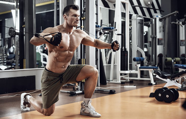 guy bodybuilder with exercise machine