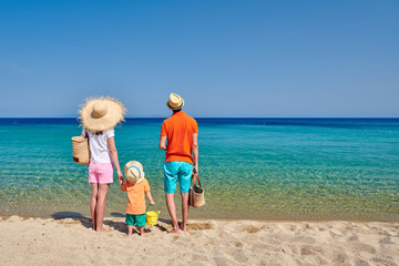 Fototapeta na wymiar Family on beach in Greece