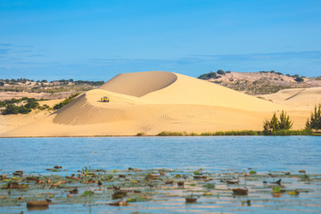 View of beautiful lake and white sand dune in Mui Ne, Vietnam