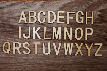 A-Z alphabet on wooden background