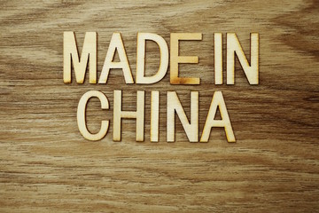 Made In China text message on wooden background