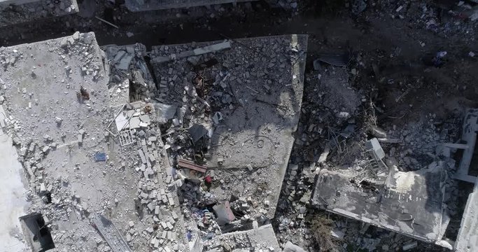 Overhead of destroyed buildings, Gaza, Syria, Rafah, Palestine, booming and war in middle east.