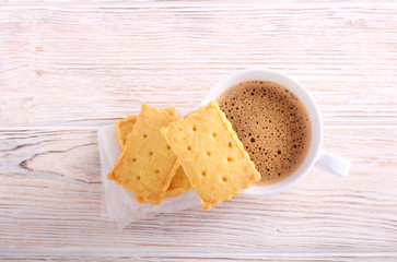 Homemade cracker and cup of coffee