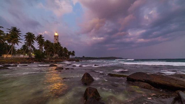 White lighthouse Dondra Head and tropical palms, Sri Lanka, near Matara.