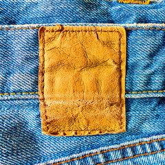 Leather label on a blue jeans