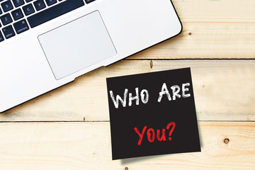 who are you, on black sticky note