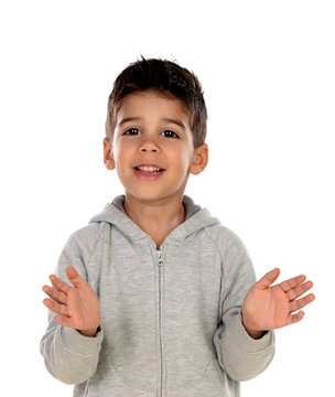 Gipsy child with grey clothes clapping