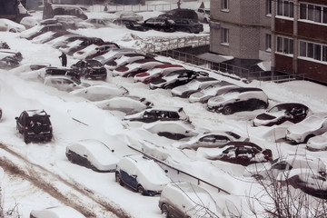 snowbound cars during a snowstorm