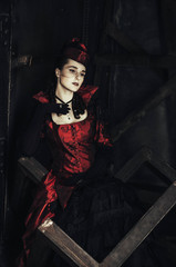 Gothic lady in 19th century red dress