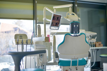 An empty dental chair.